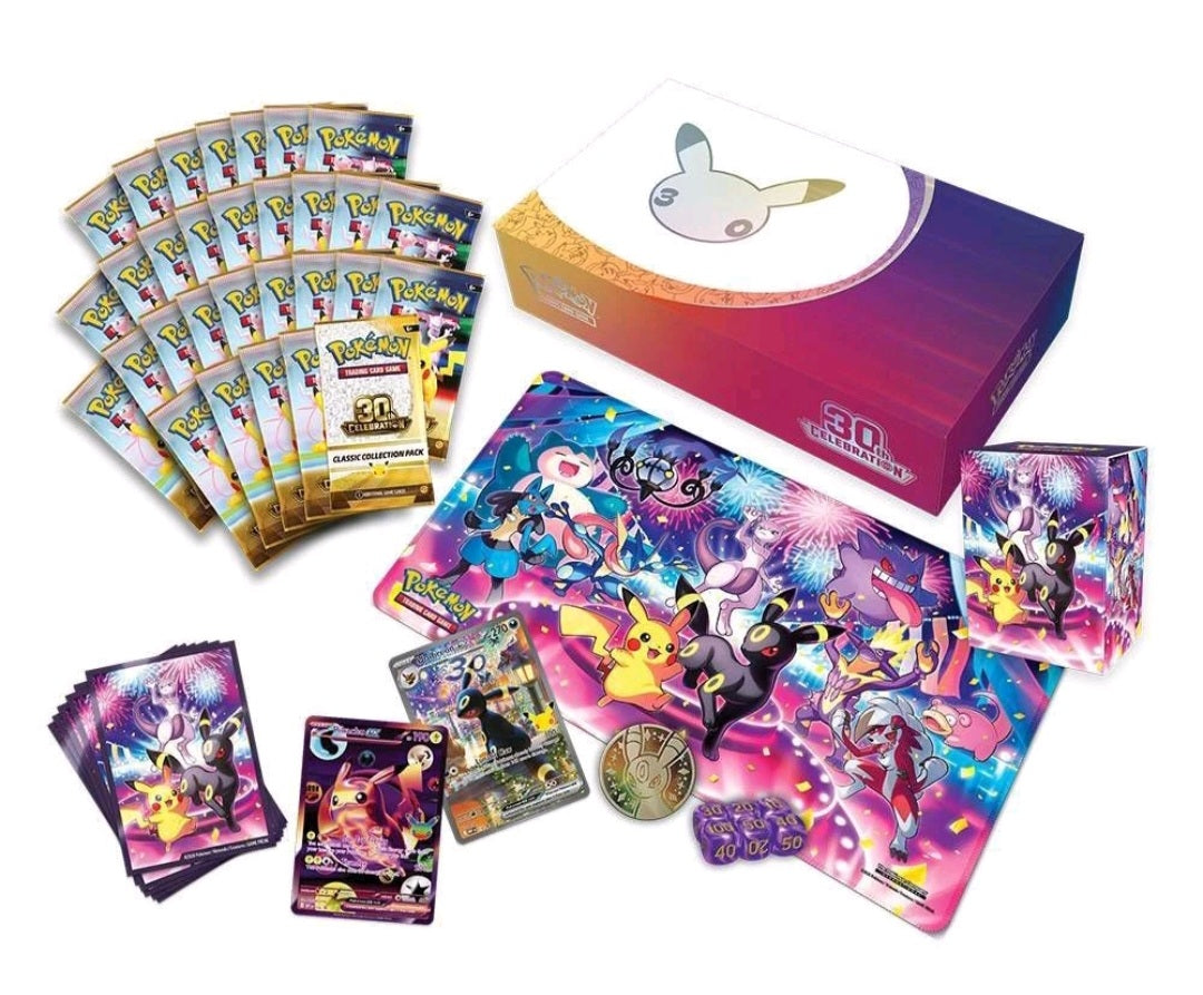 Pokémon 30th Celebration Night collection contents with booster packs, playmat, sleeves, deck box, promo cards, coin, and dice